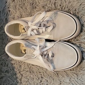 These are light blue Vans shoes